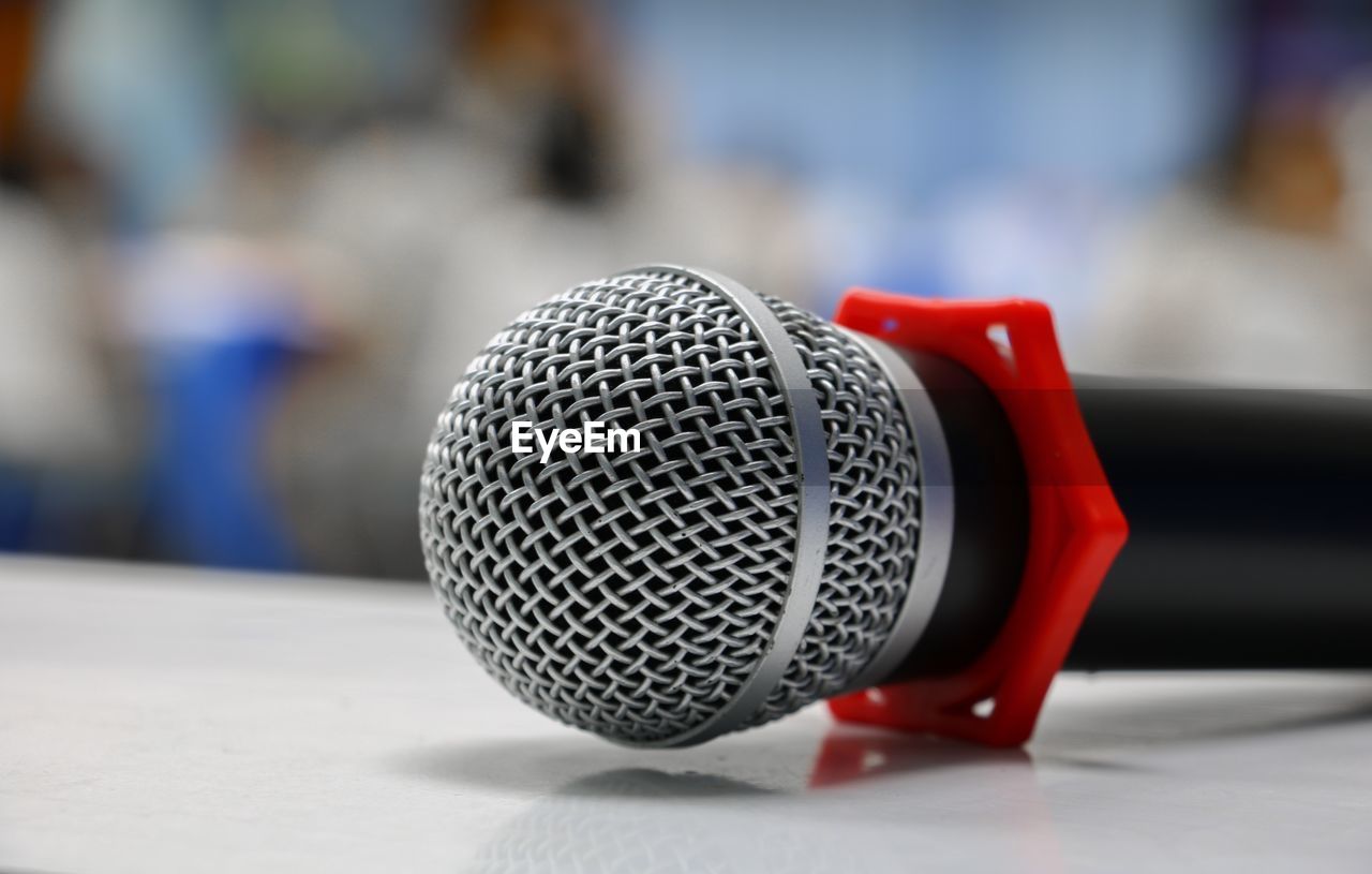 Close-up of microphone on table