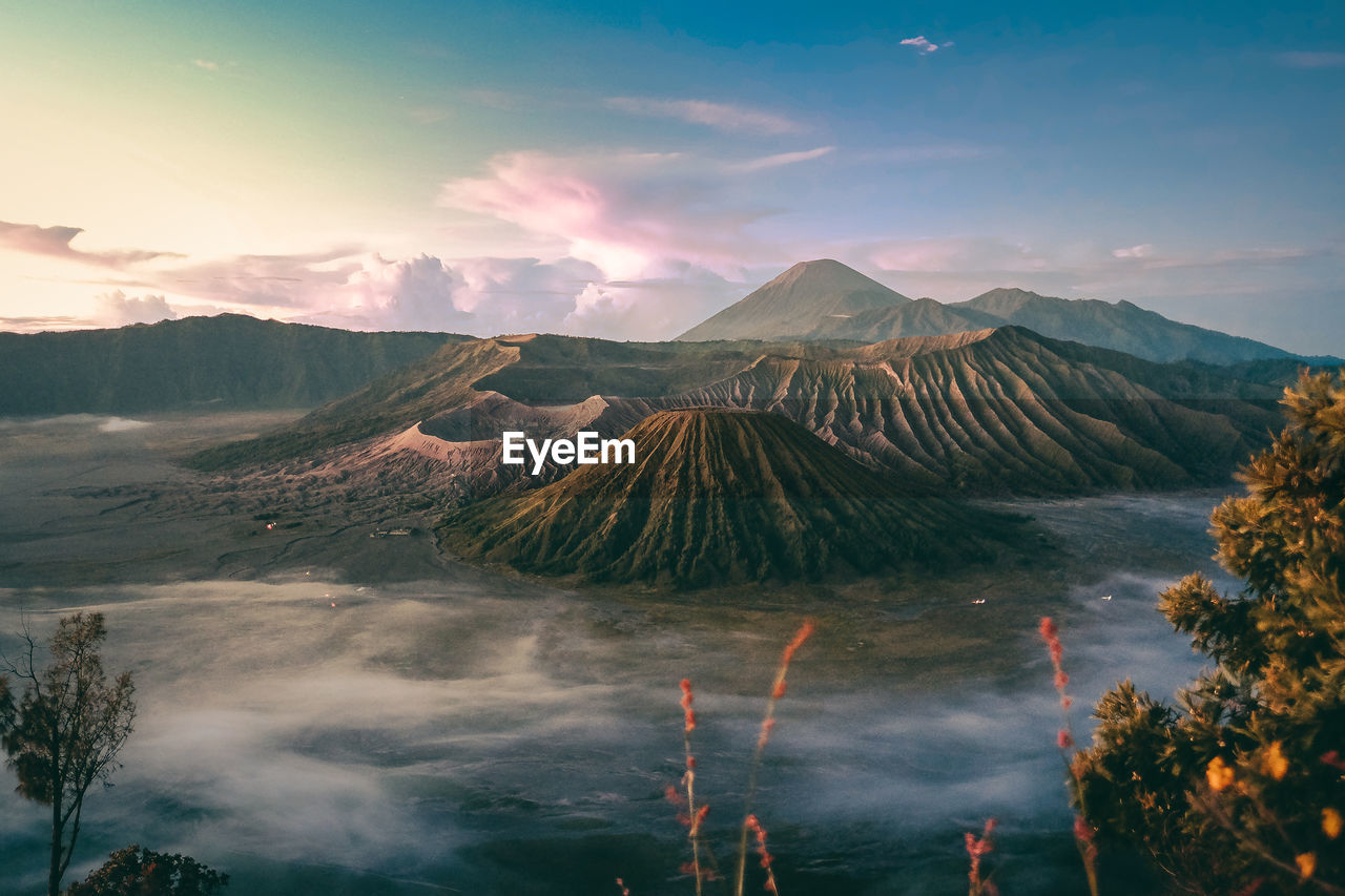 Scenic view of volcanic landscape against sky