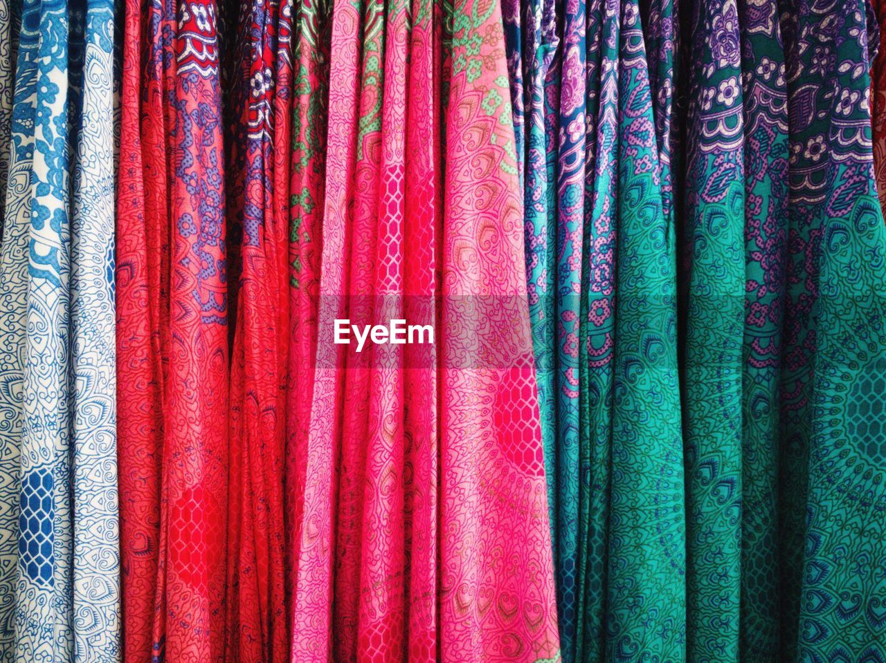 Full frame shot of colorful fabrics for sale at store