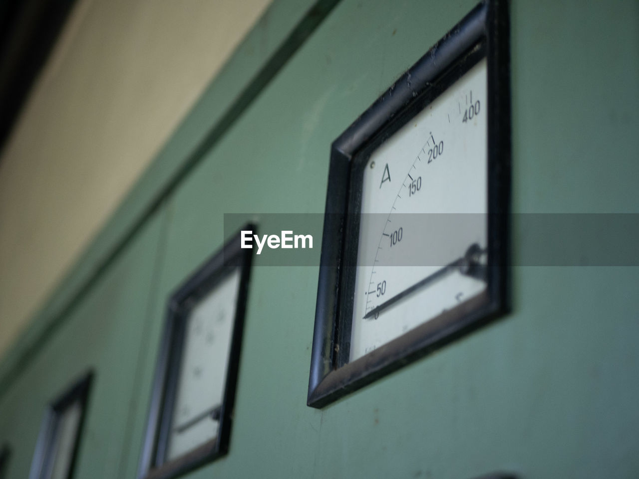 Close-up of clock on wall