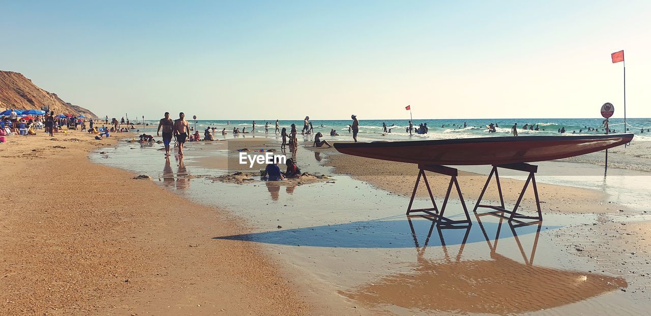 GROUP OF PEOPLE ON BEACH