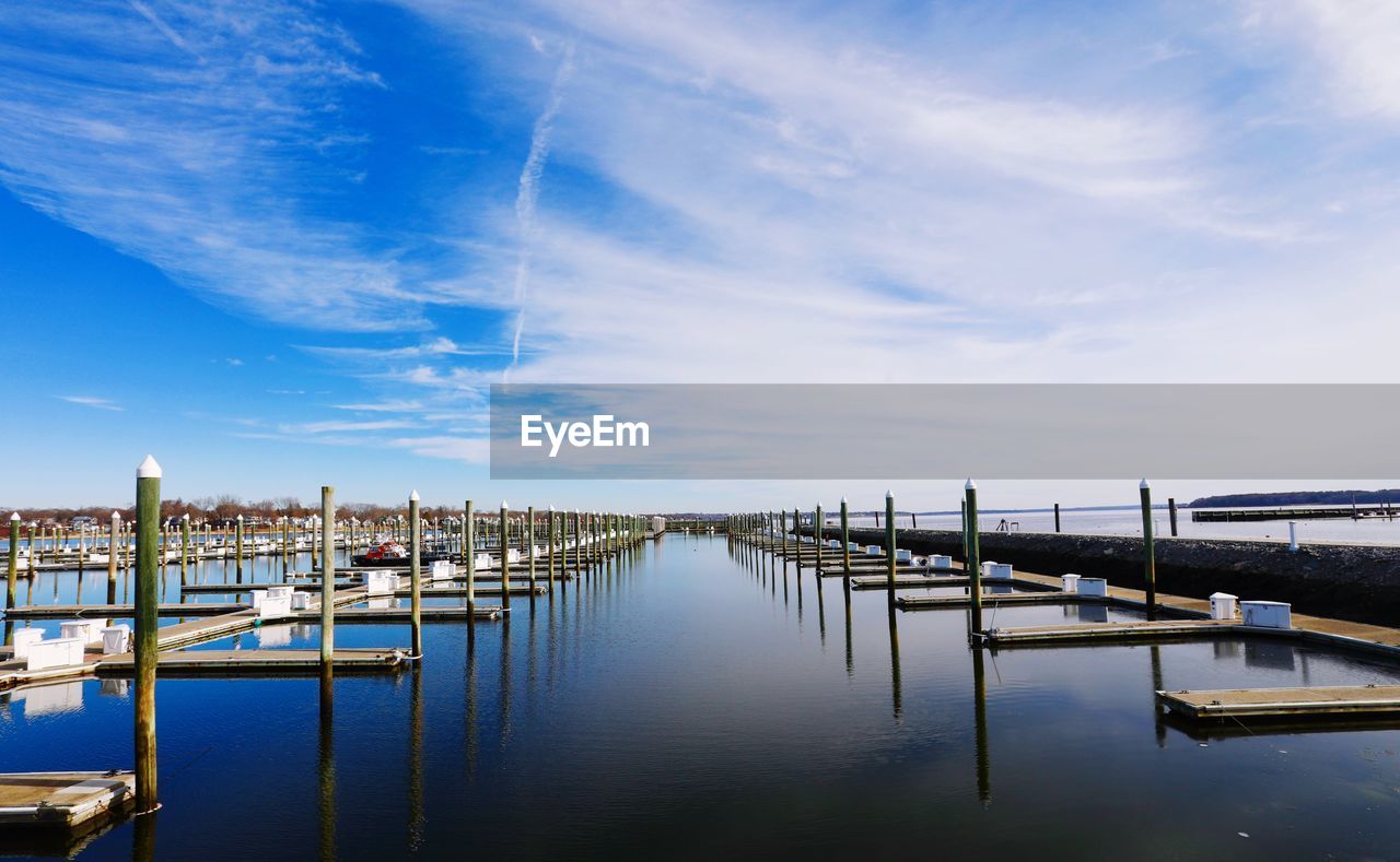 Boats moored at harbor