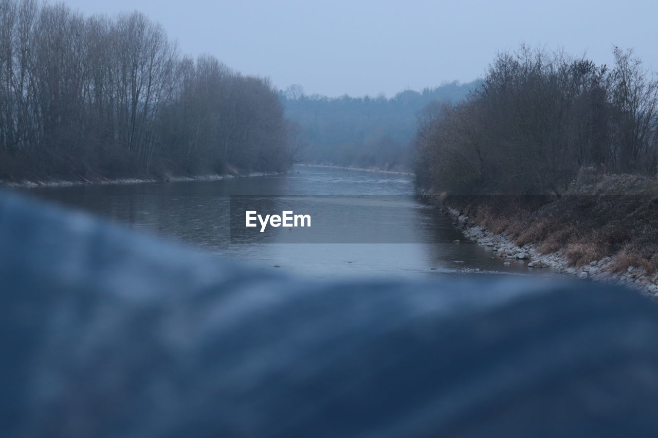 SCENIC VIEW OF RIVER AGAINST SKY DURING WINTER