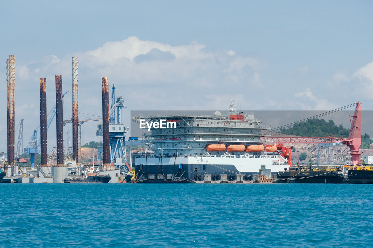 Ship in sea against sky