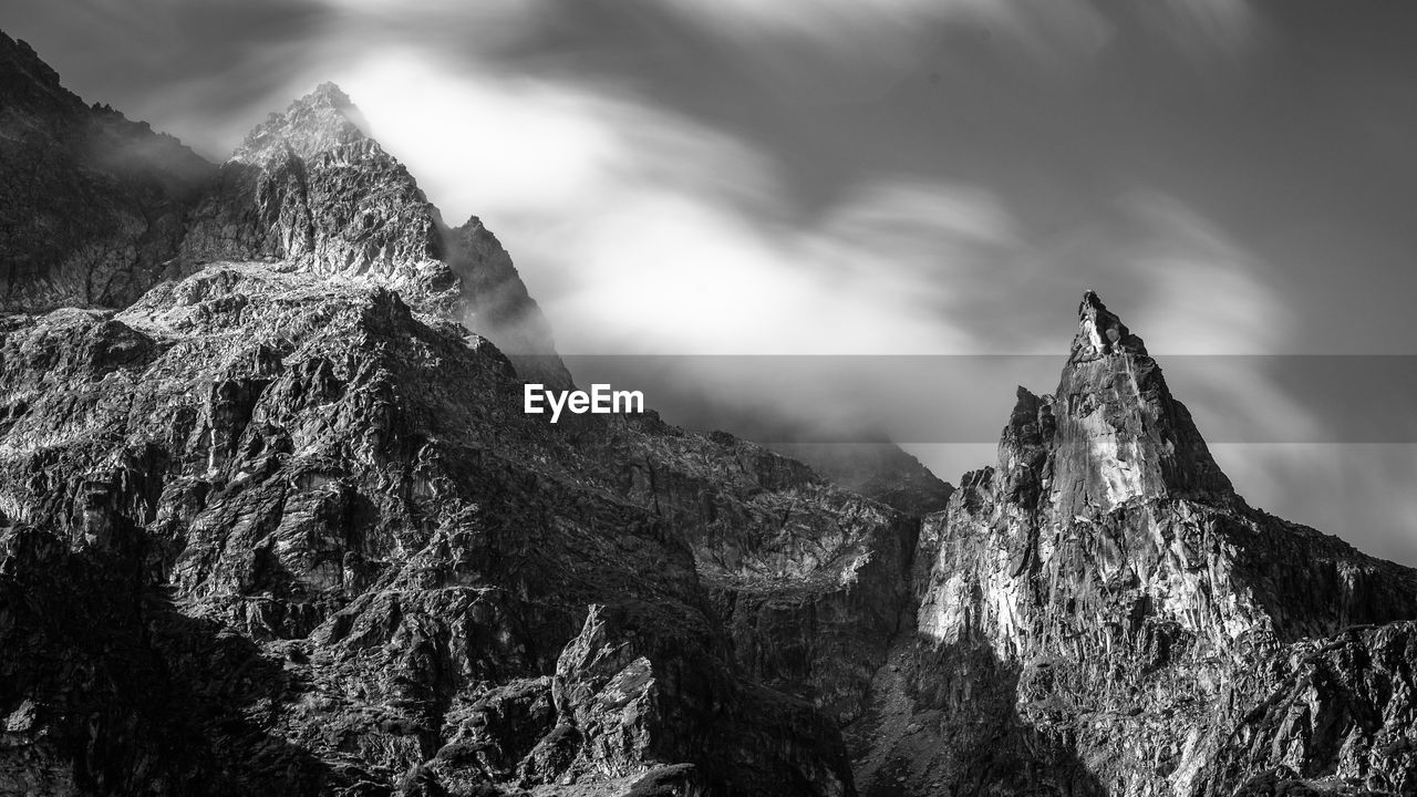 Panoramic view of rock formation against sky