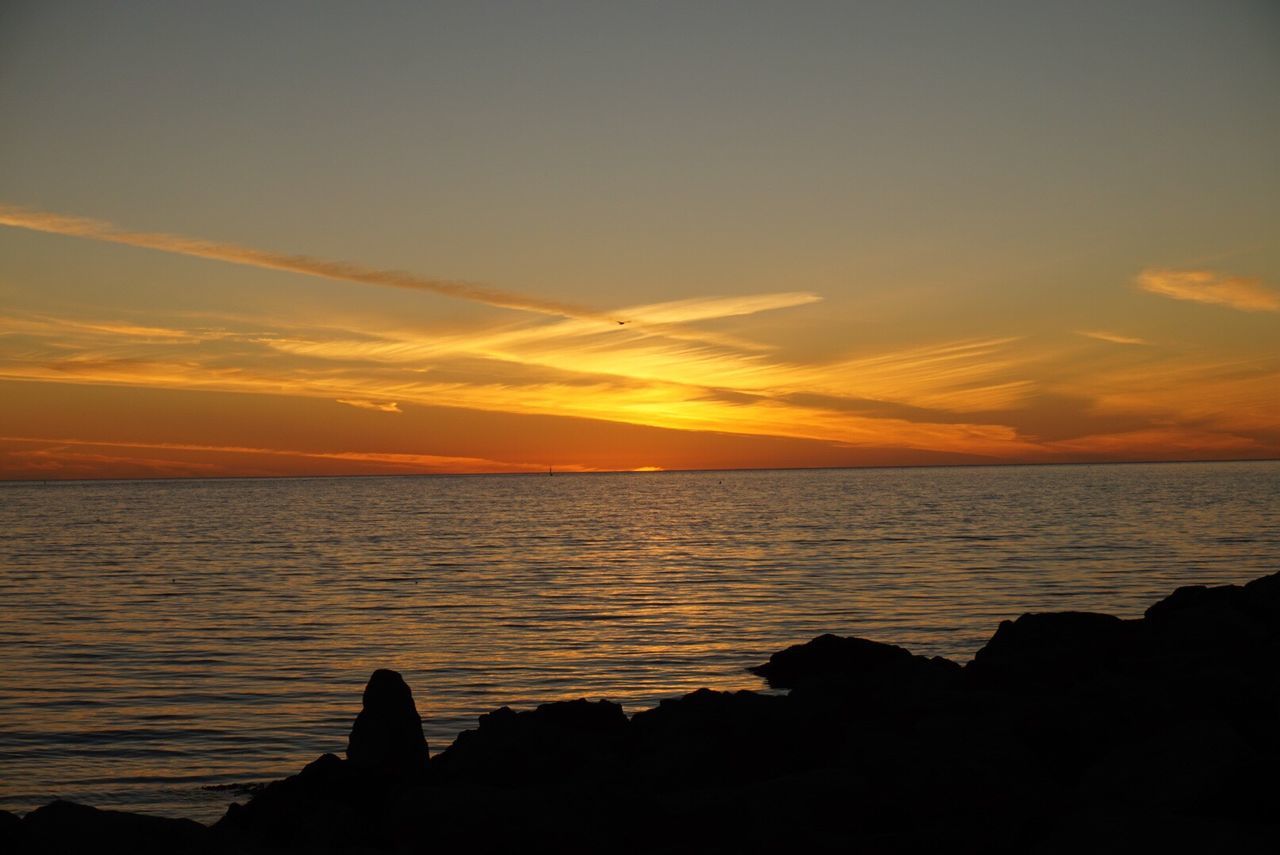 SUNSET OVER SEA