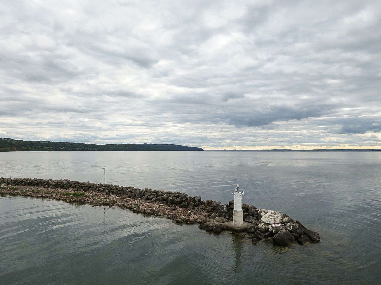 VIEW OF SEA AGAINST CLOUDY SKY