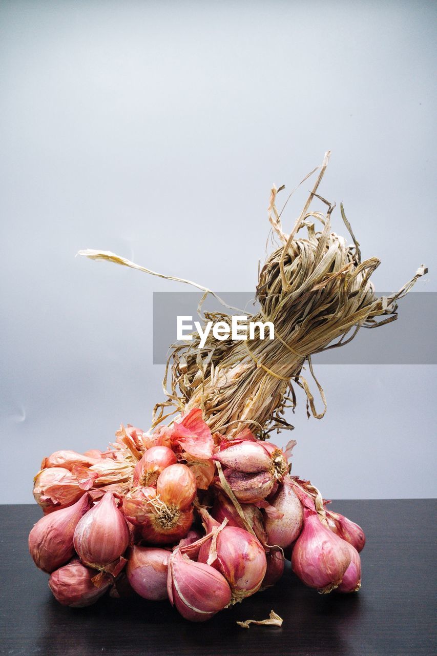 Close-up of onions on table