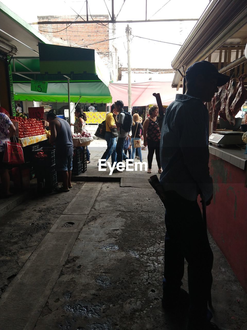 PEOPLE ON STREET IN CITY