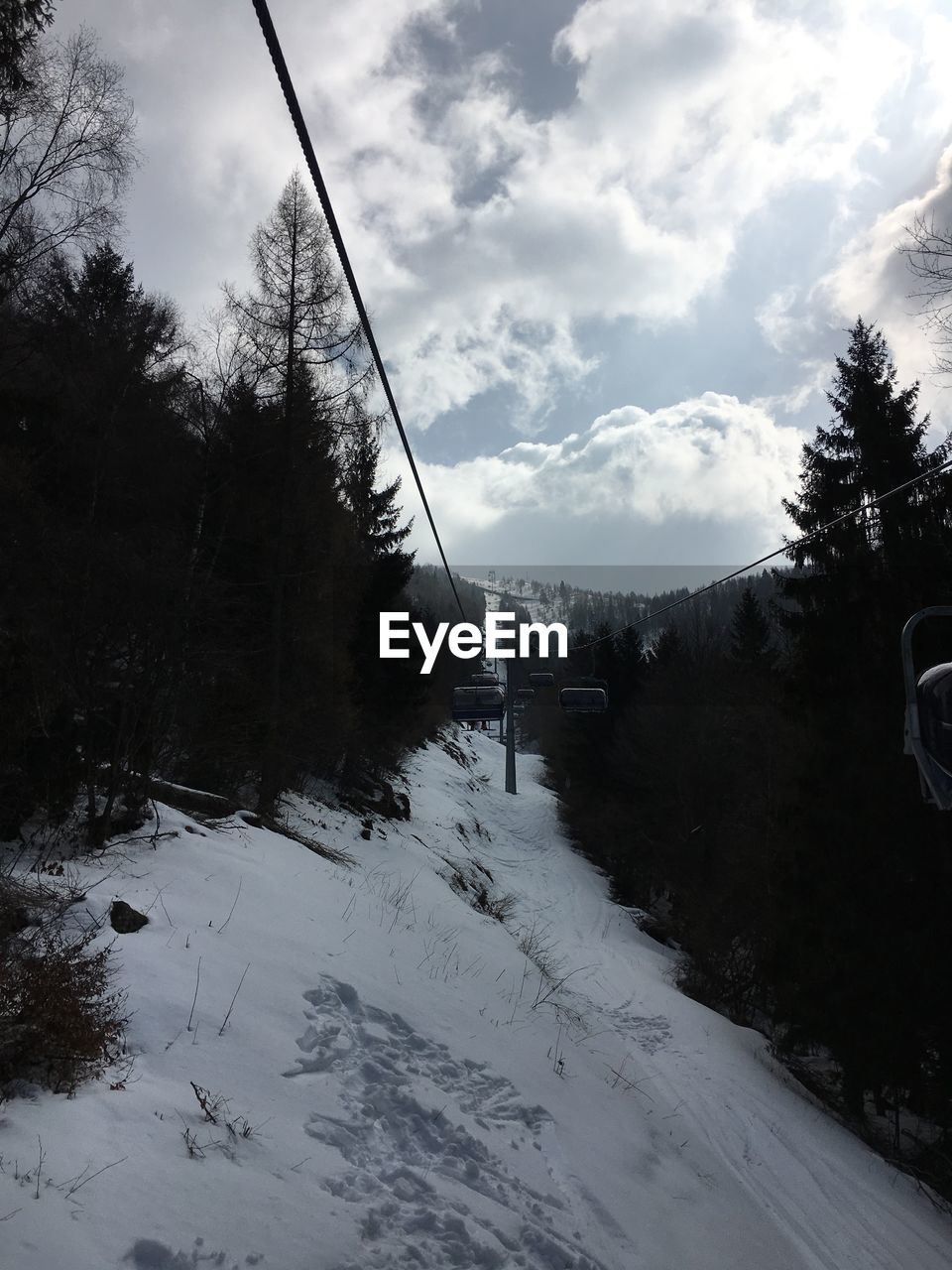 VIEW OF MOUNTAIN AGAINST CLOUDY SKY