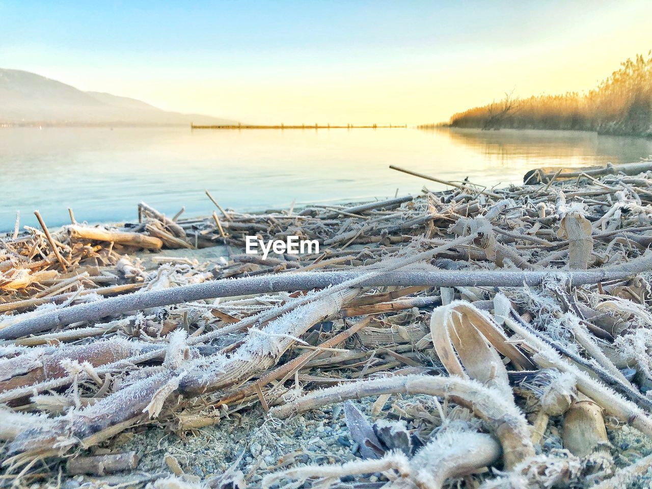 Scenic view of frozen lake against sky