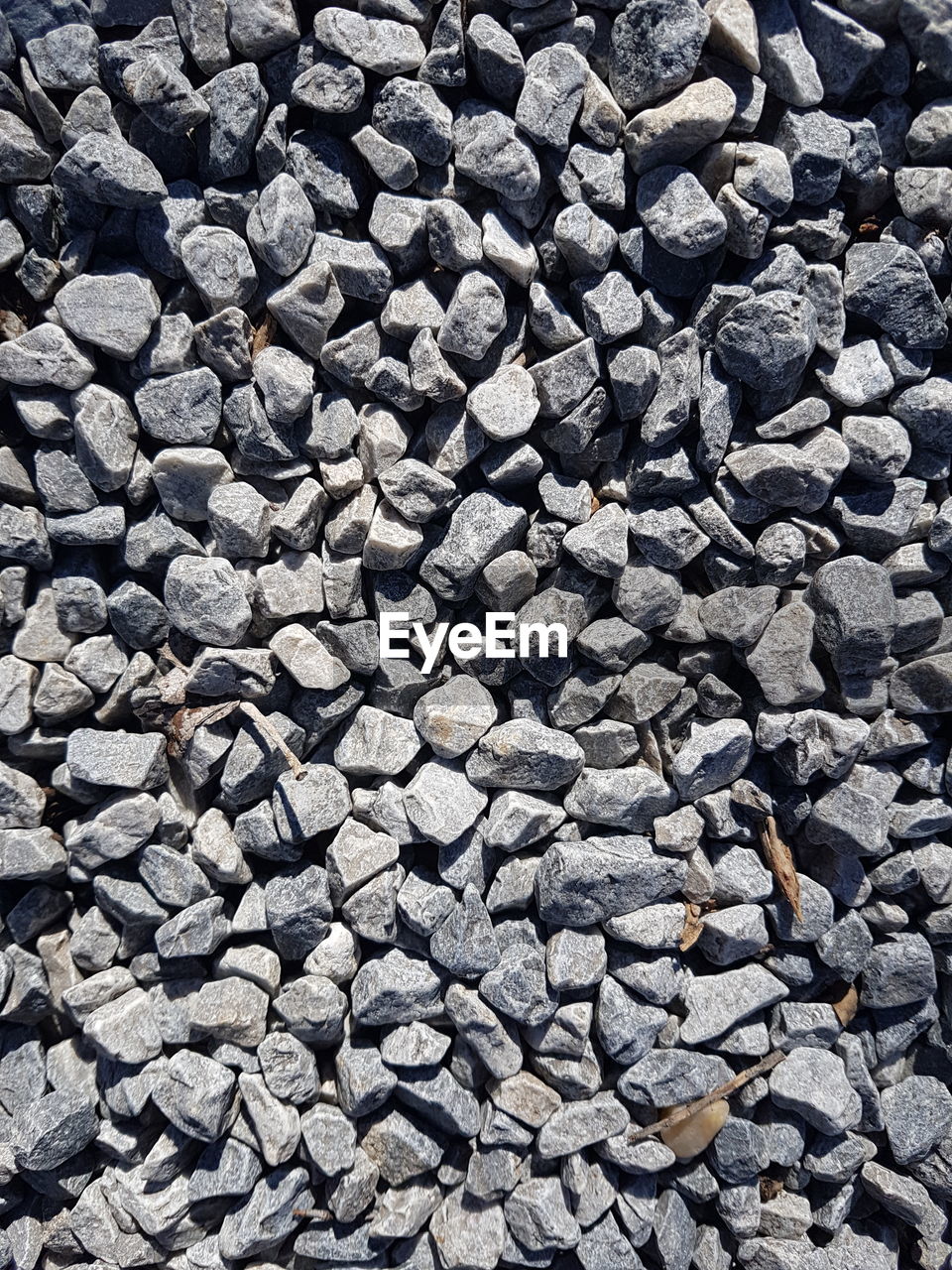 Gray crushed stone texture. rocks background