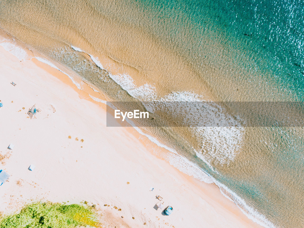 HIGH ANGLE VIEW OF WET SHORE