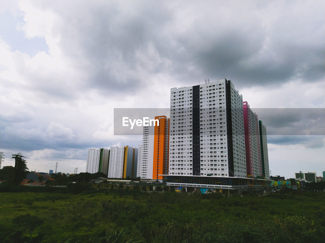 Modern buildings against sky in city