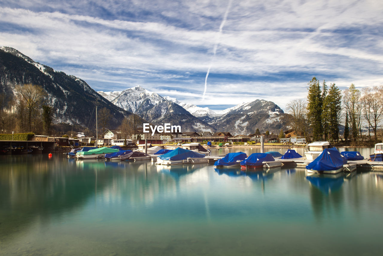 Scenic view of lake against sky during winter