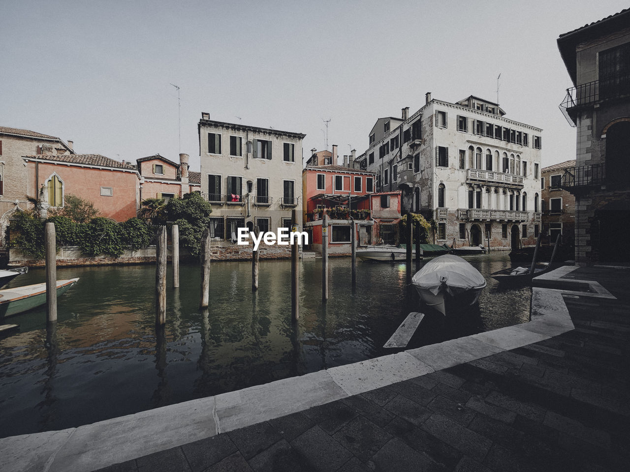 Buildings in city against clear sky in venice