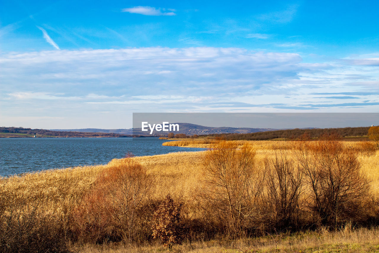 Scenic view of lake against sky