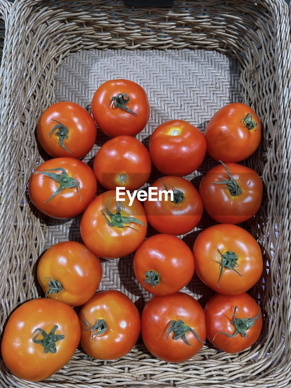 tomato, food, food and drink, healthy eating, freshness, basket, vegetable, wellbeing, container, produce, plant, fruit, no people, high angle view, large group of objects, still life, directly above, plum tomato, wicker, indoors, close-up