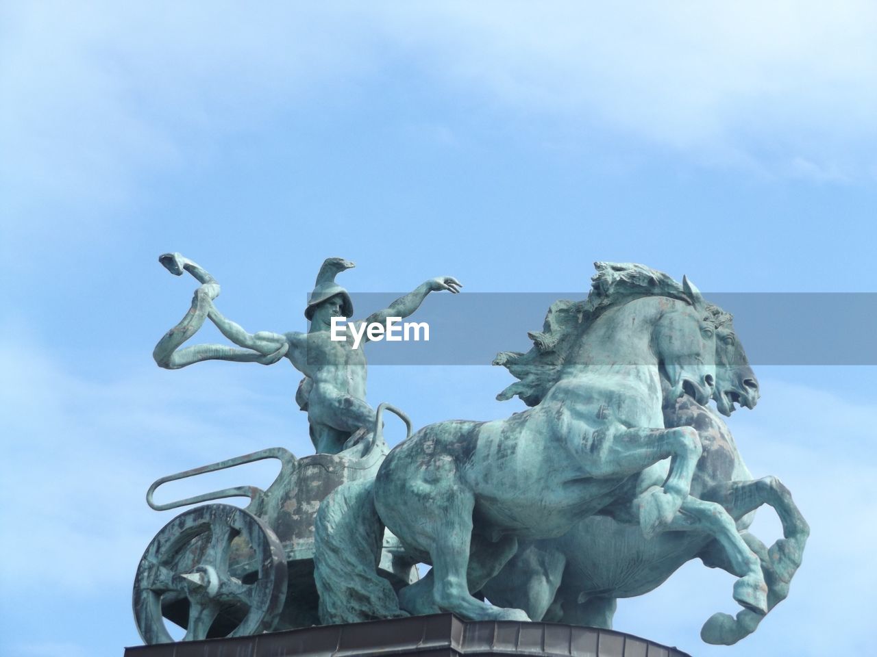 Low angle view of statue against the sky