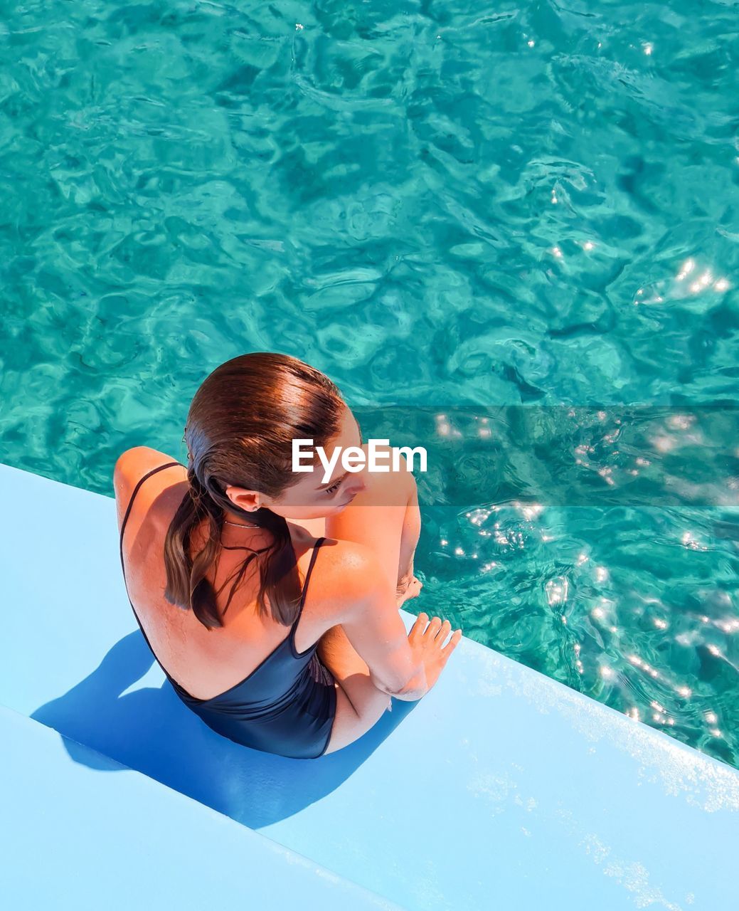 High angle view of woman in swimming pool