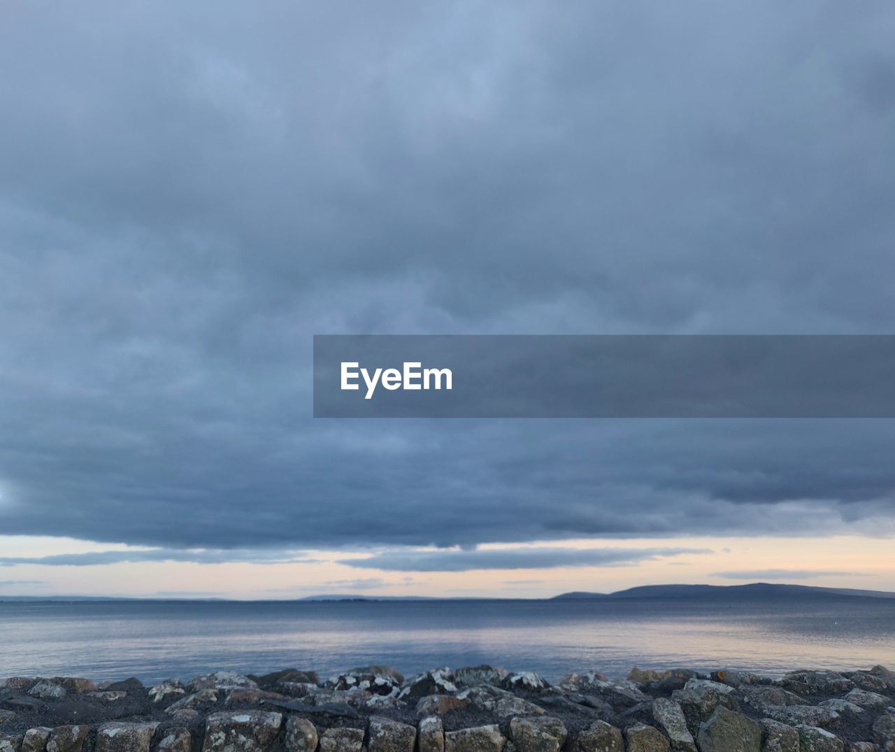 SCENIC VIEW OF SEA AND ROCKS