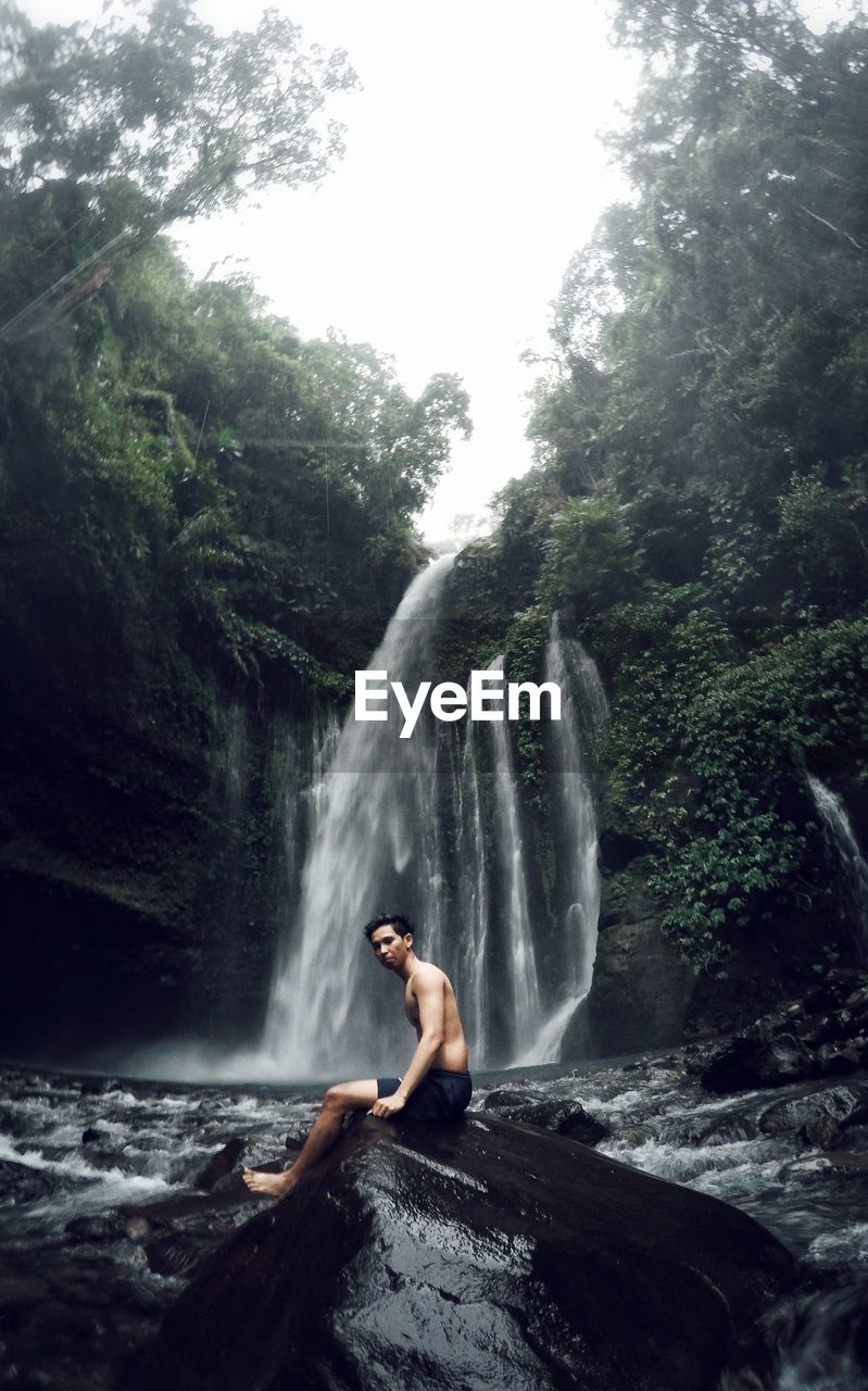 View of waterfall in forest