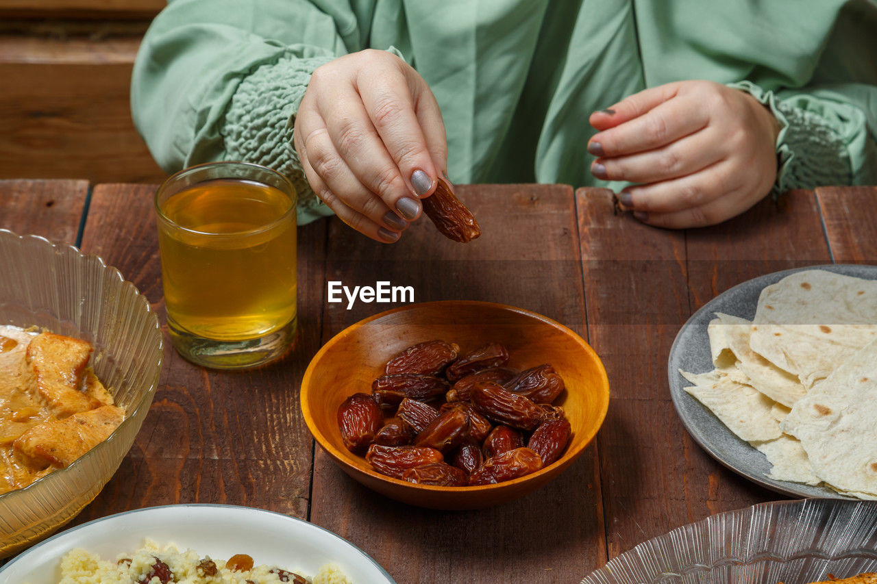 midsection of man having food