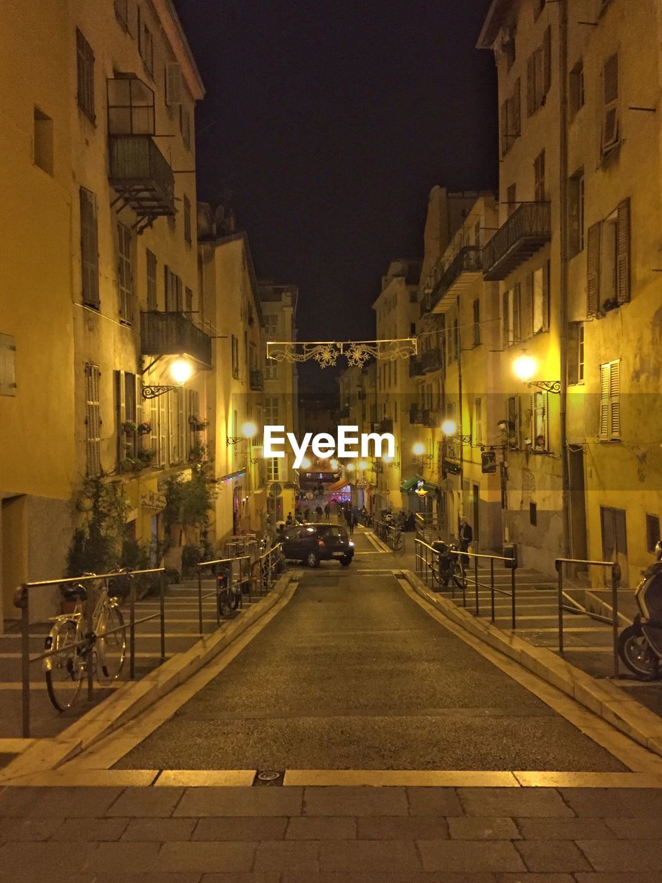 STREET LIGHT ON ROAD AT NIGHT