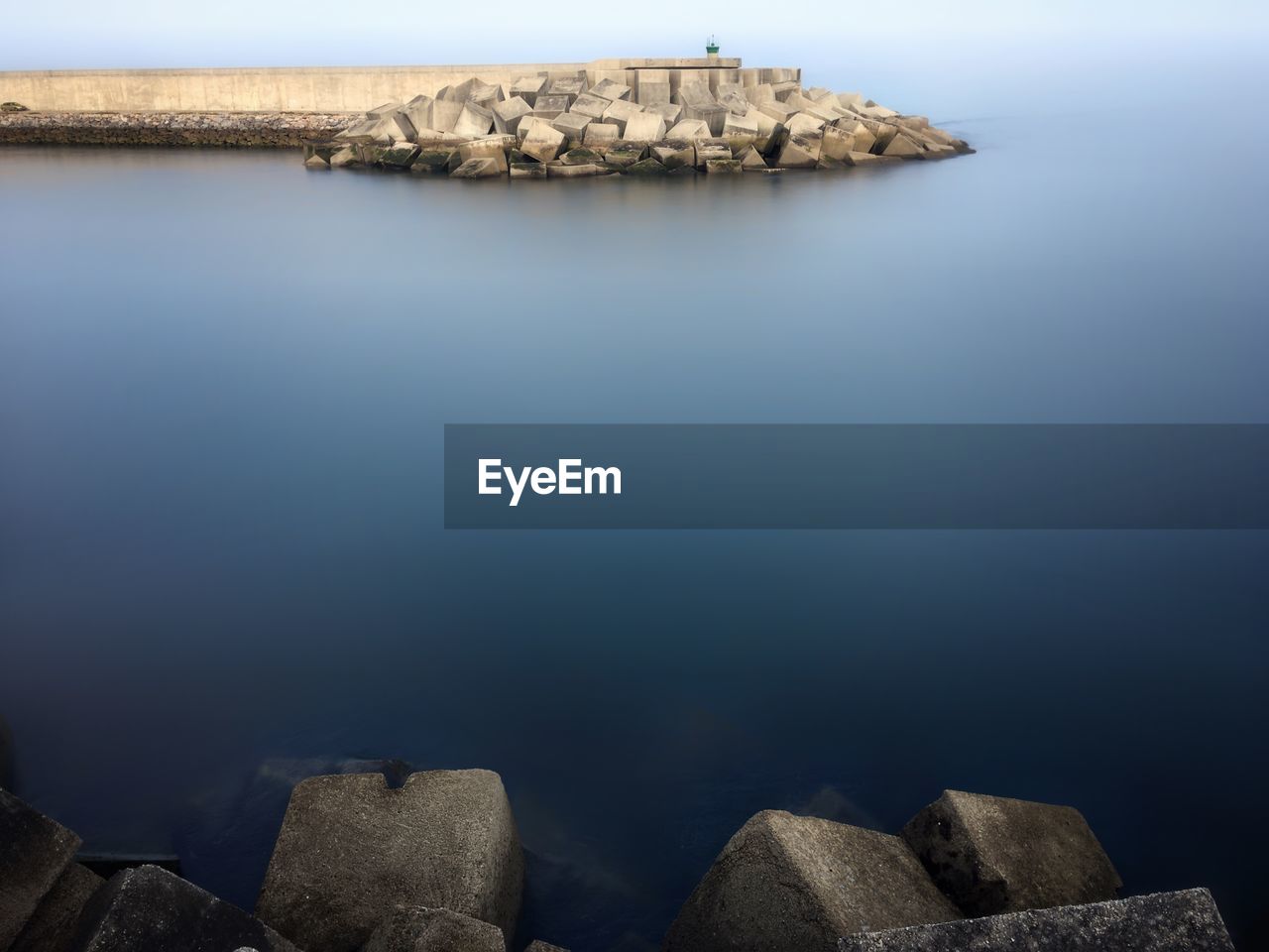 Panoramic view of sea and rocks against sky iñigo. entrance to the port