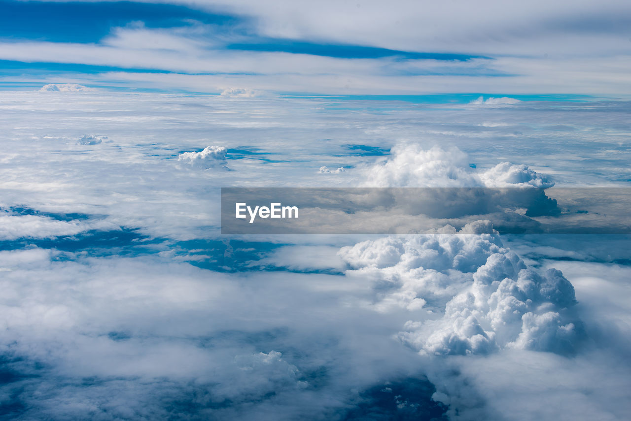 Aerial view of cloudscape over sea against sky