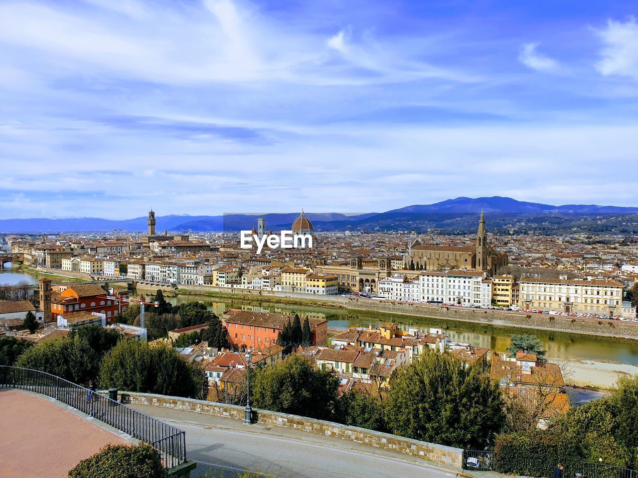 High angle view of bridge and buildings against sky