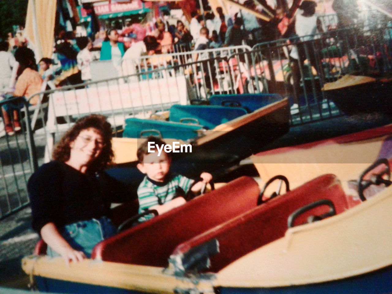 MEN IN AMUSEMENT PARK