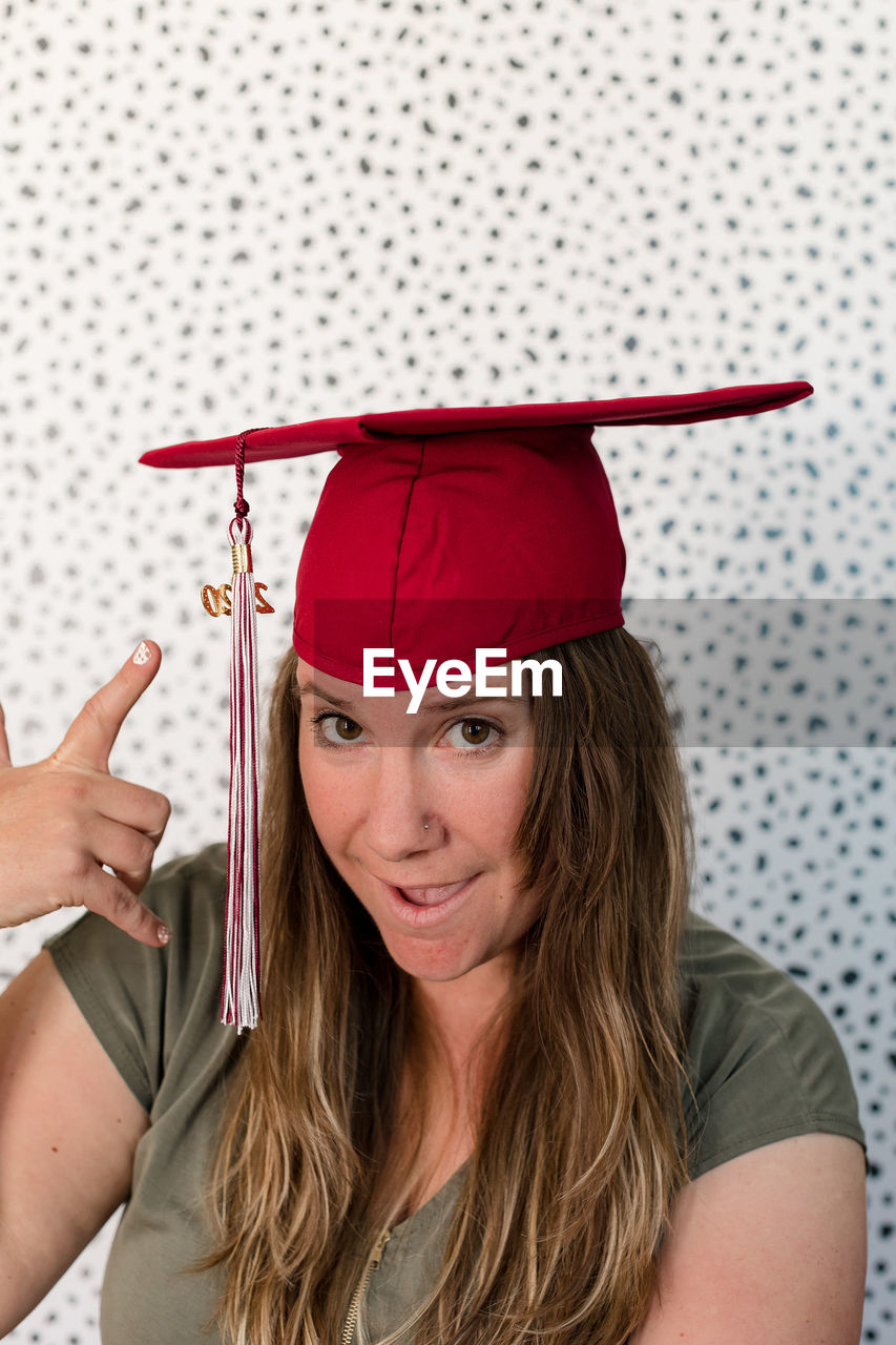 Portrait of woman wearing mortarboard