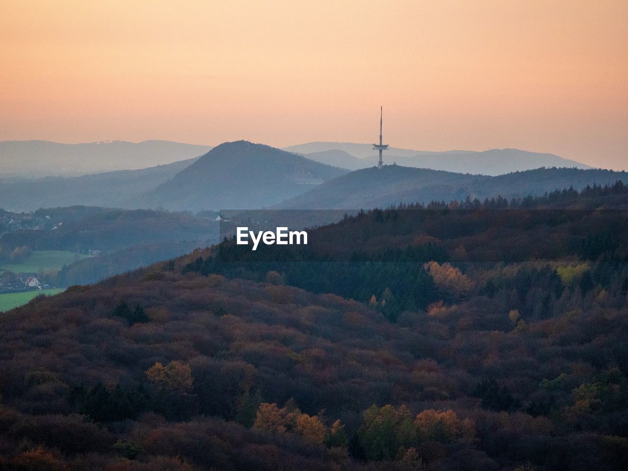 Scenic view of mountains against sky during sunset