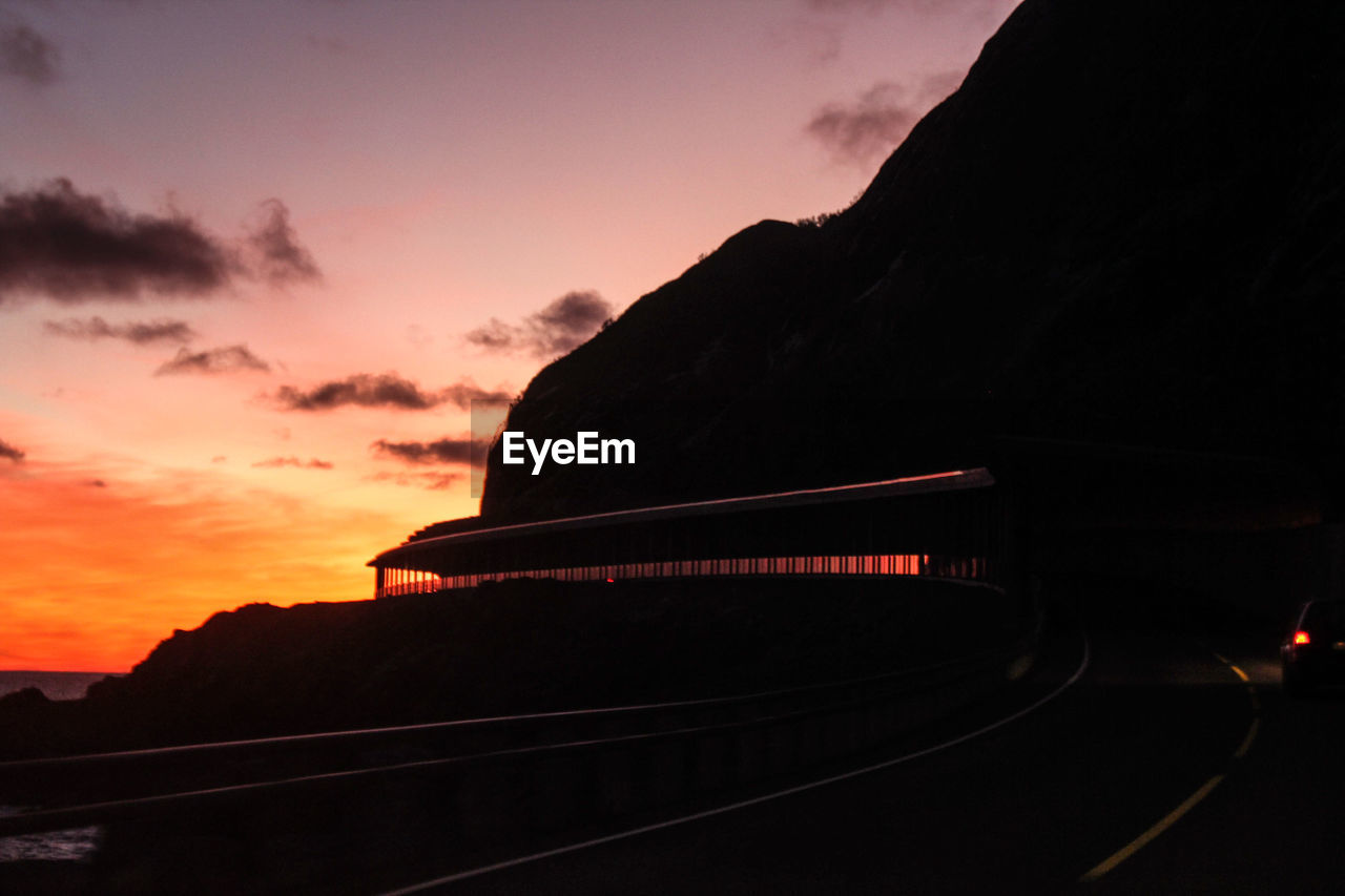 View of railway tracks at dusk