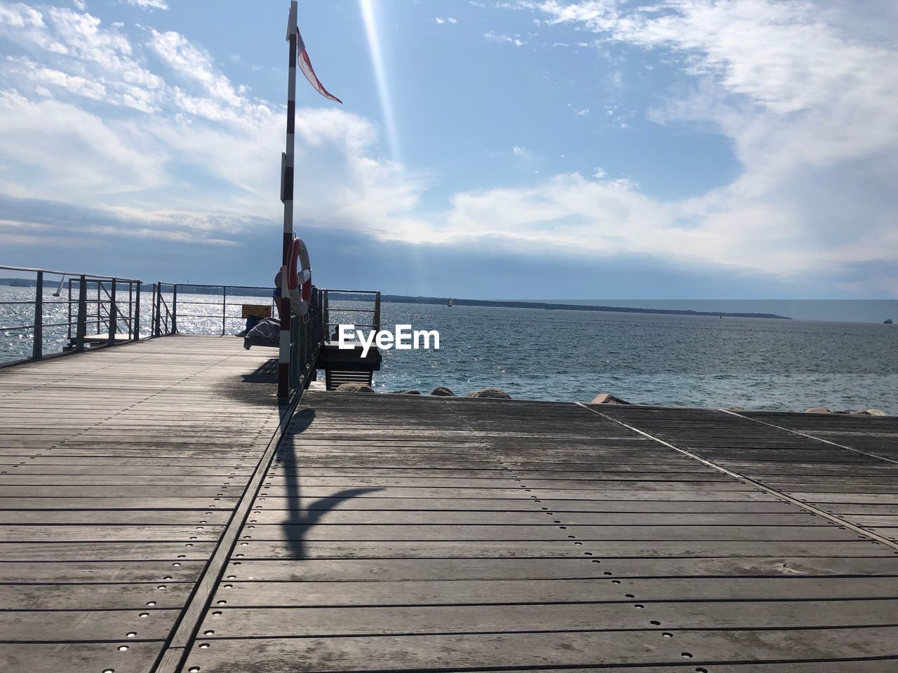 SCENIC VIEW OF PIER ON SEA AGAINST SKY