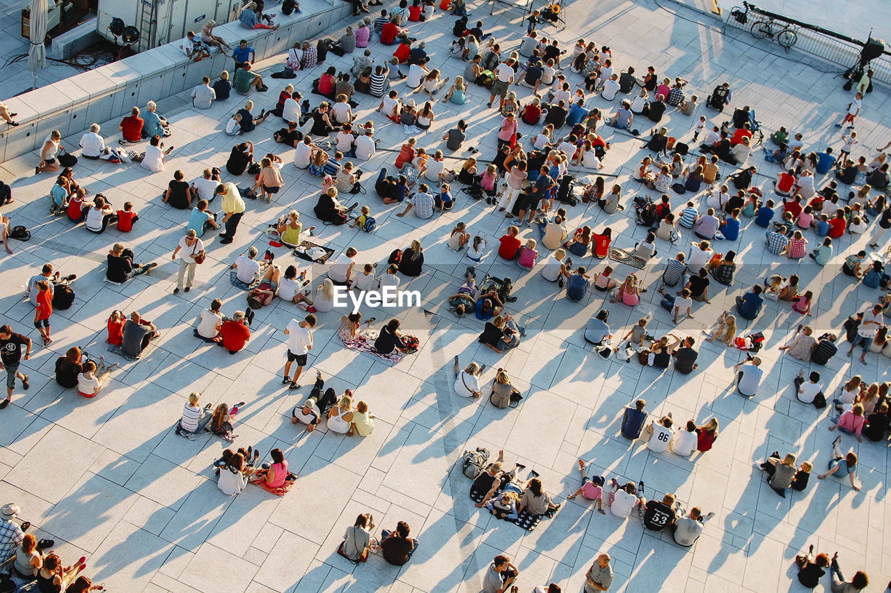 High angle view of people sitting at oslo opera house