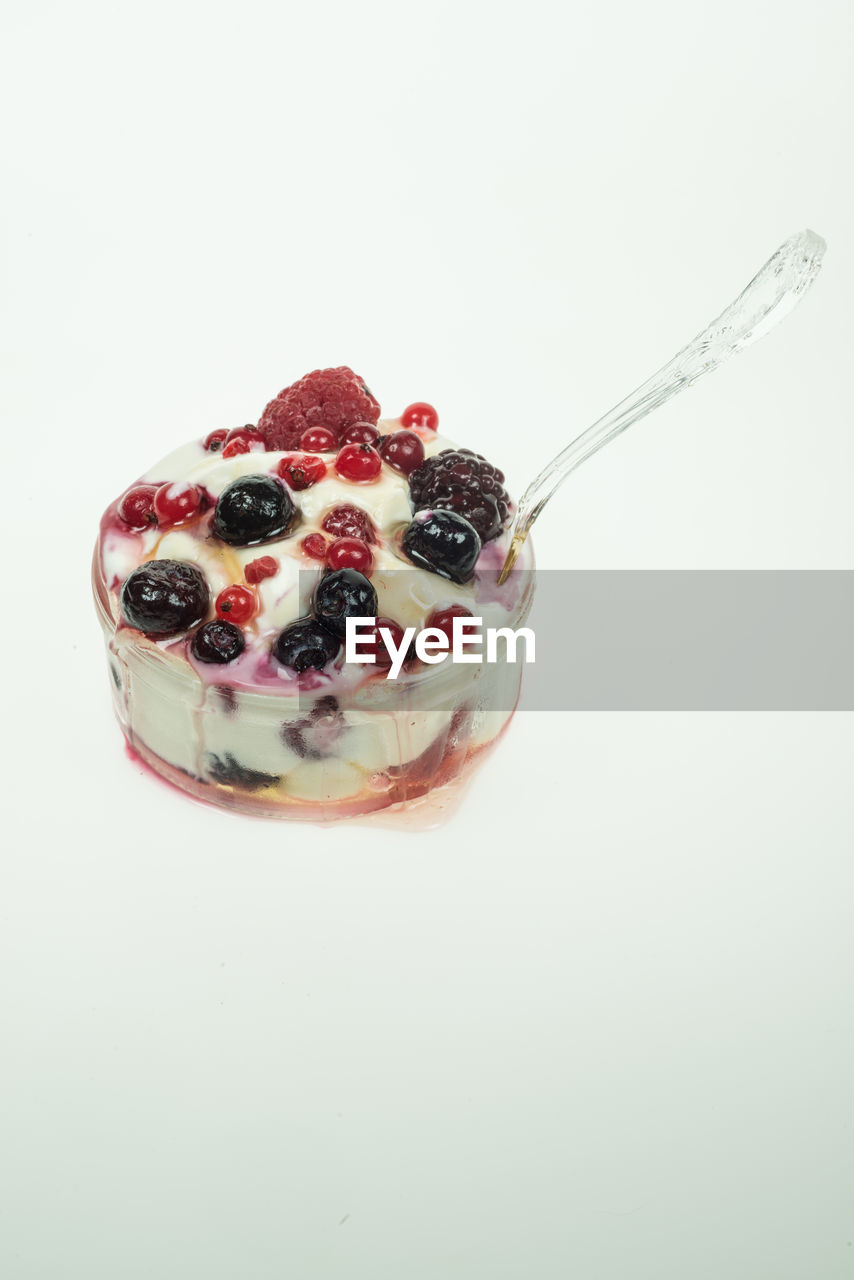 Close-up of dessert against white background