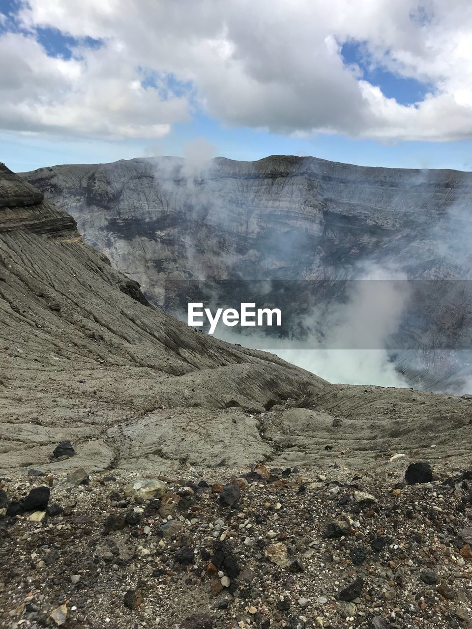 SMOKE EMITTING FROM VOLCANIC LANDSCAPE