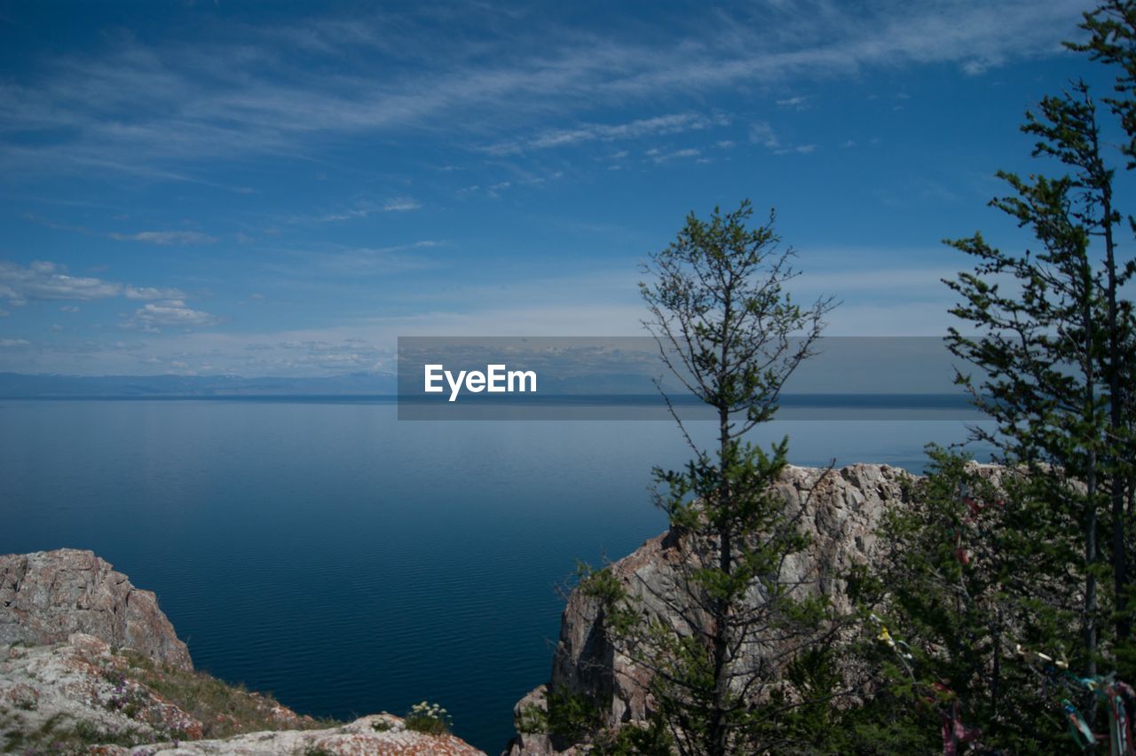 Scenic view of sea against blue sky