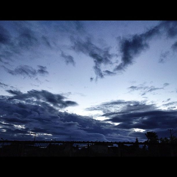 SCENIC VIEW OF CLOUDY SKY OVER LANDSCAPE