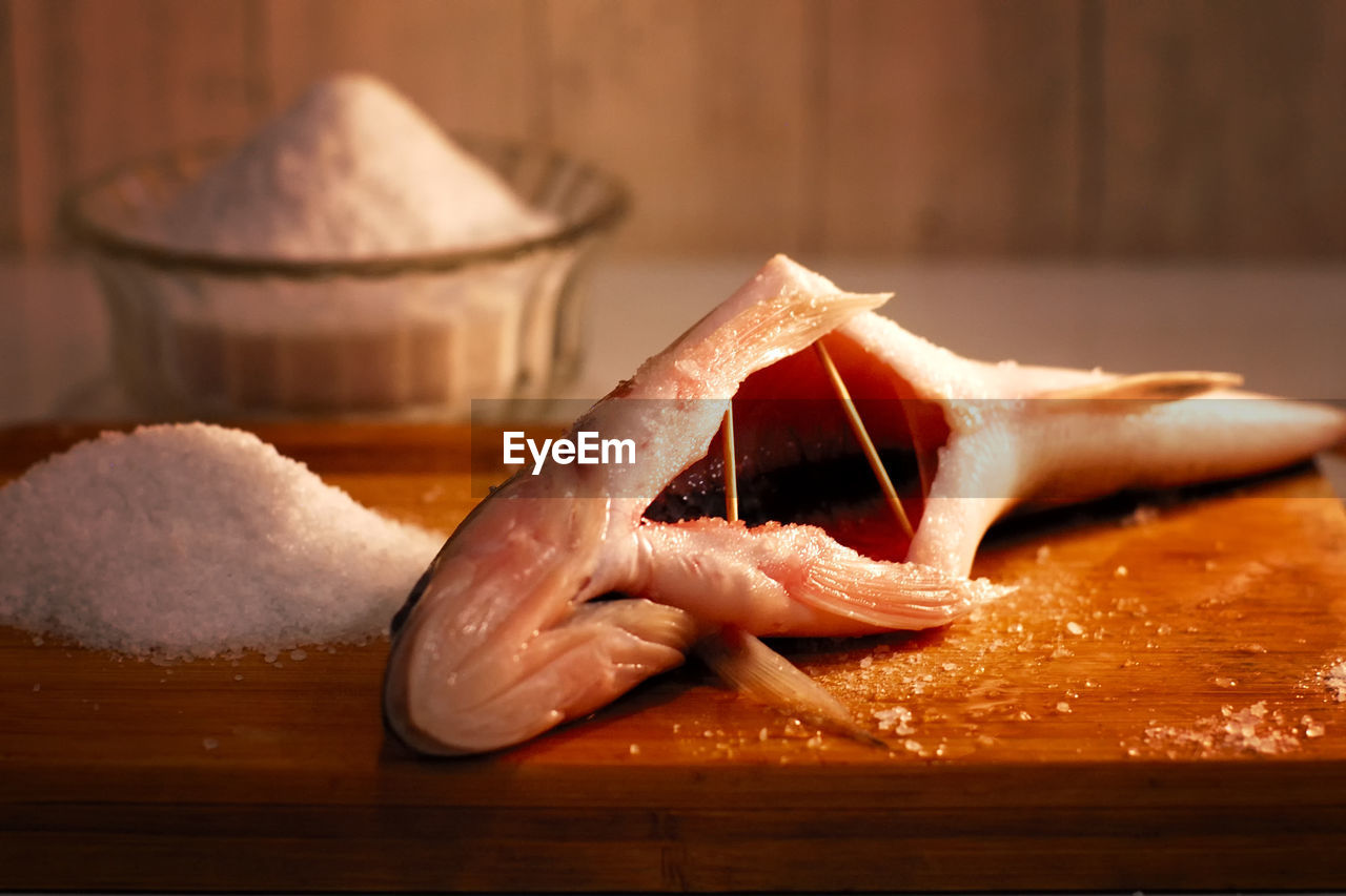 Close-up of fish on cutting board