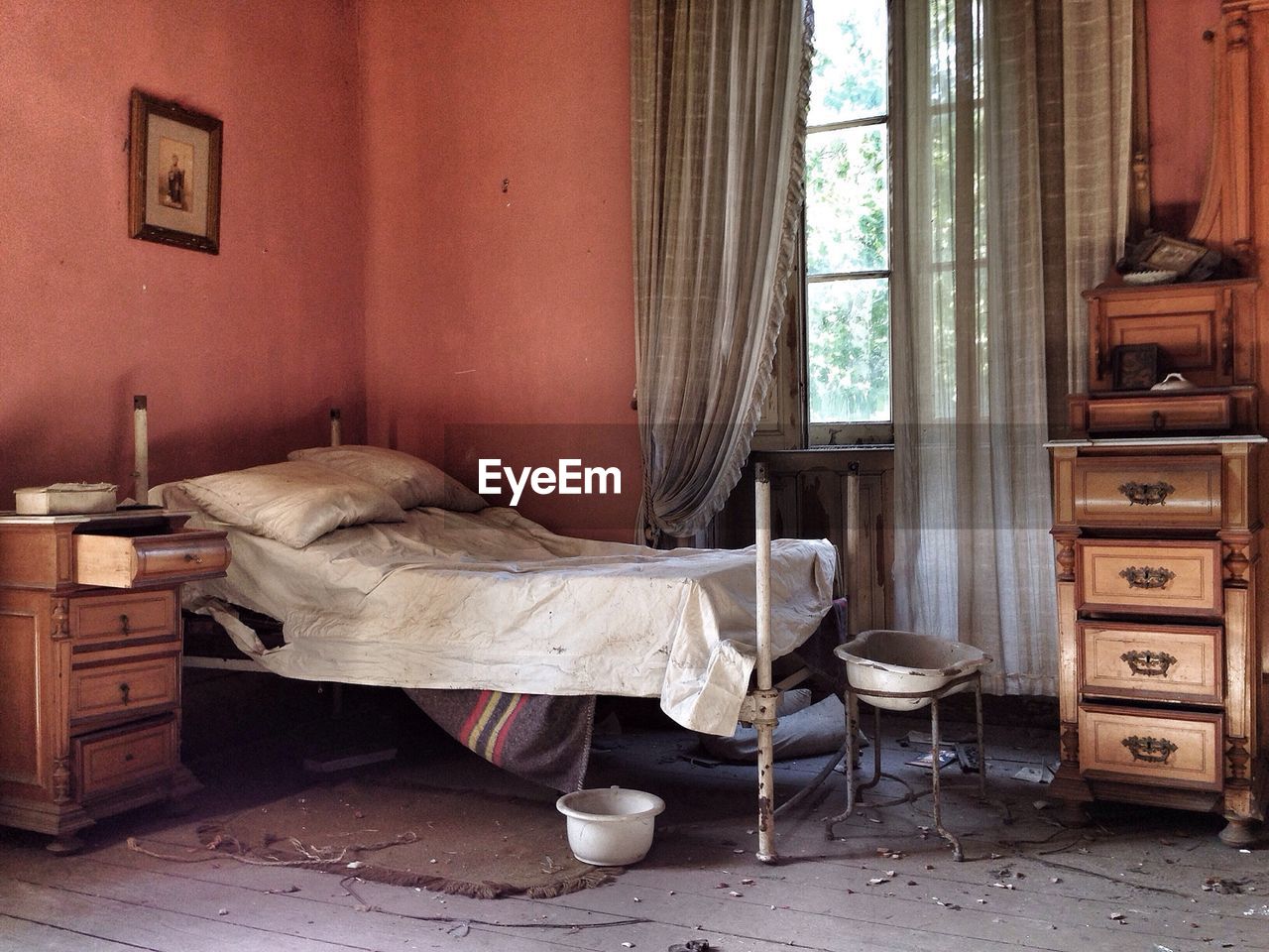 Interior of abandoned bedroom at home