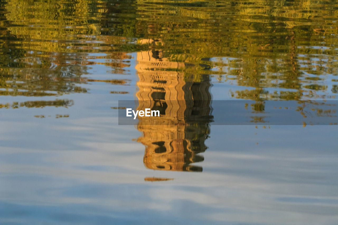 REFLECTION OF LAKE IN A BOAT