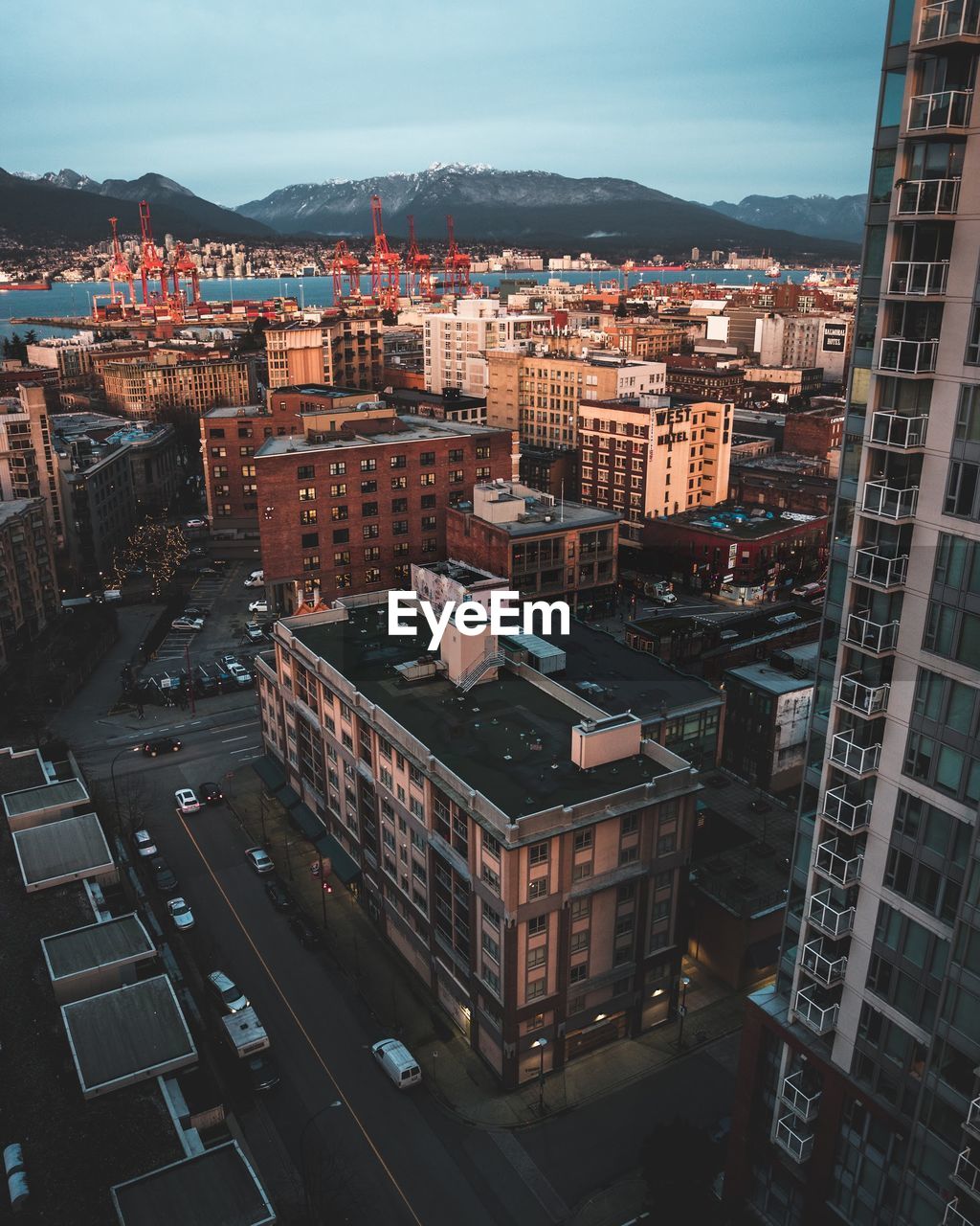 High angle view of street amidst buildings in city