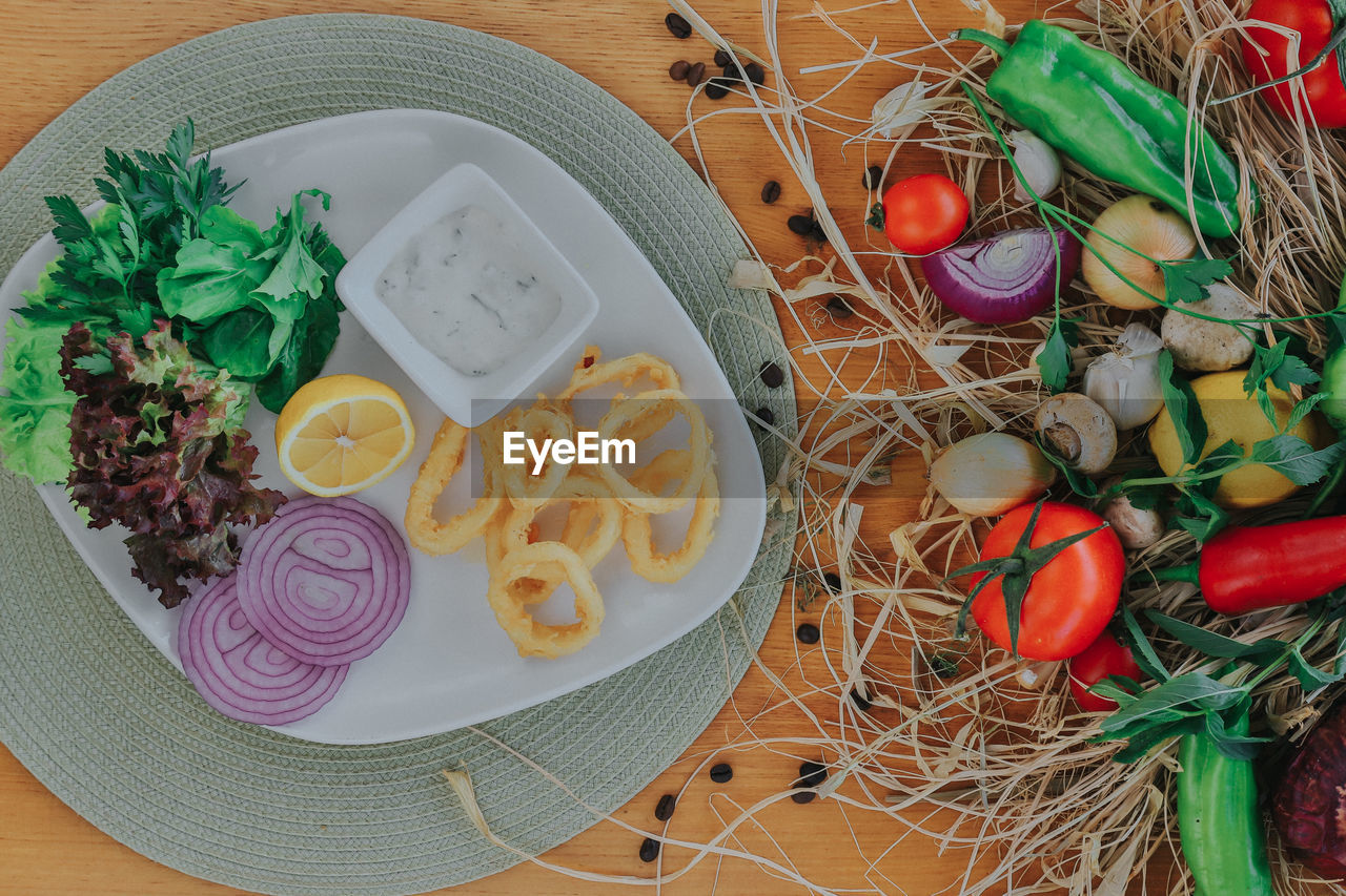 High angle view of vegetables in plate on table