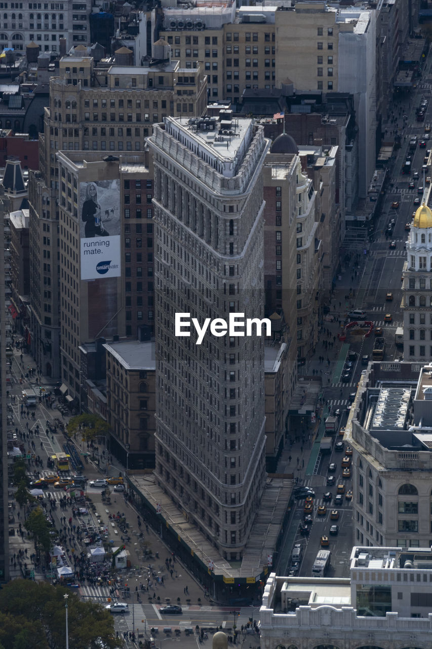 High angle view of street amidst buildings in city