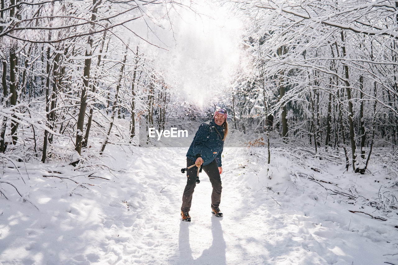 Full length of man on snow covered field