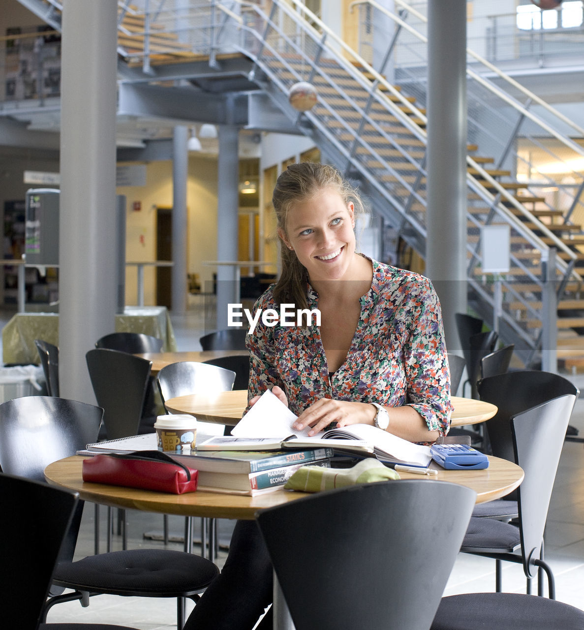 University student sitting in cafe