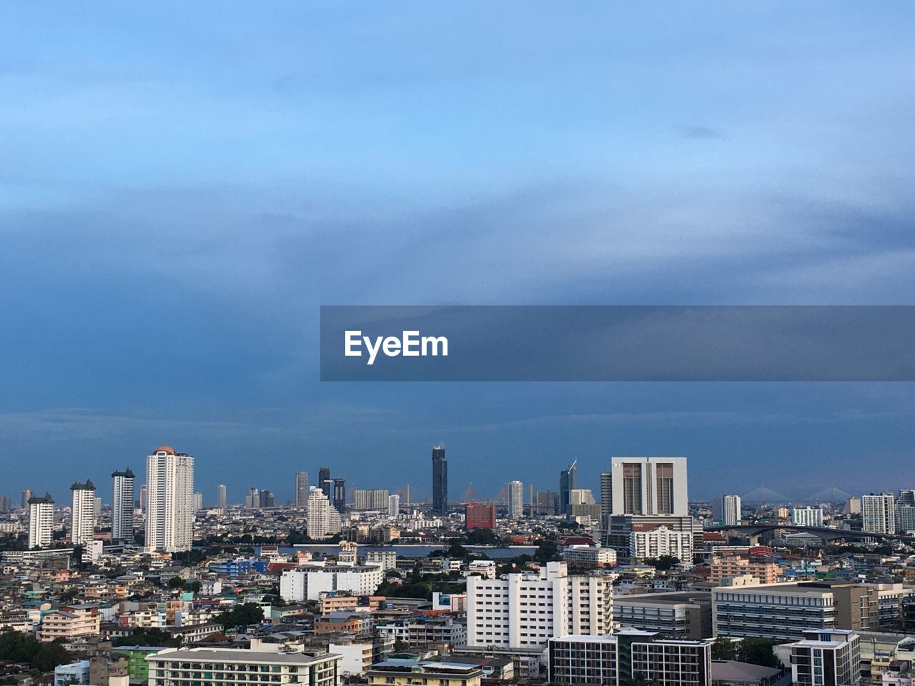 Modern buildings in city against sky